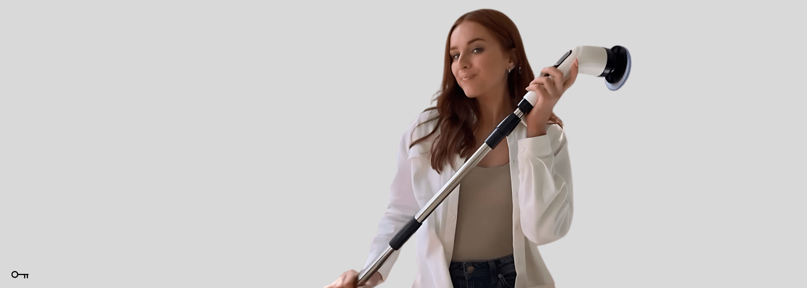 girl holding 7 in 1 spin scrubber